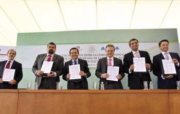 ›› La Comisión Federal de Electricidad y la Asociación Mexicana de la Industria Automotriz (AMIA) firmaron un convenio de colaboración.