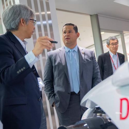 Denso executives in Japan and Guanajuato government representatives during the investment announcement.