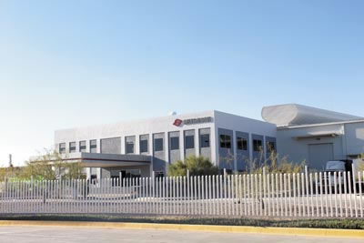 ›› Fotografía del exterior de la planta de Musashi, ubicada en San Luis Potosí.